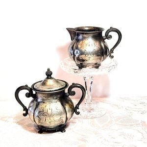Set Of 4×silver plated sugar and creamer set. By Van Bergh Rochester NY.